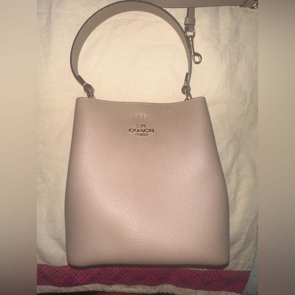 Coach tan bucket bag with wallet